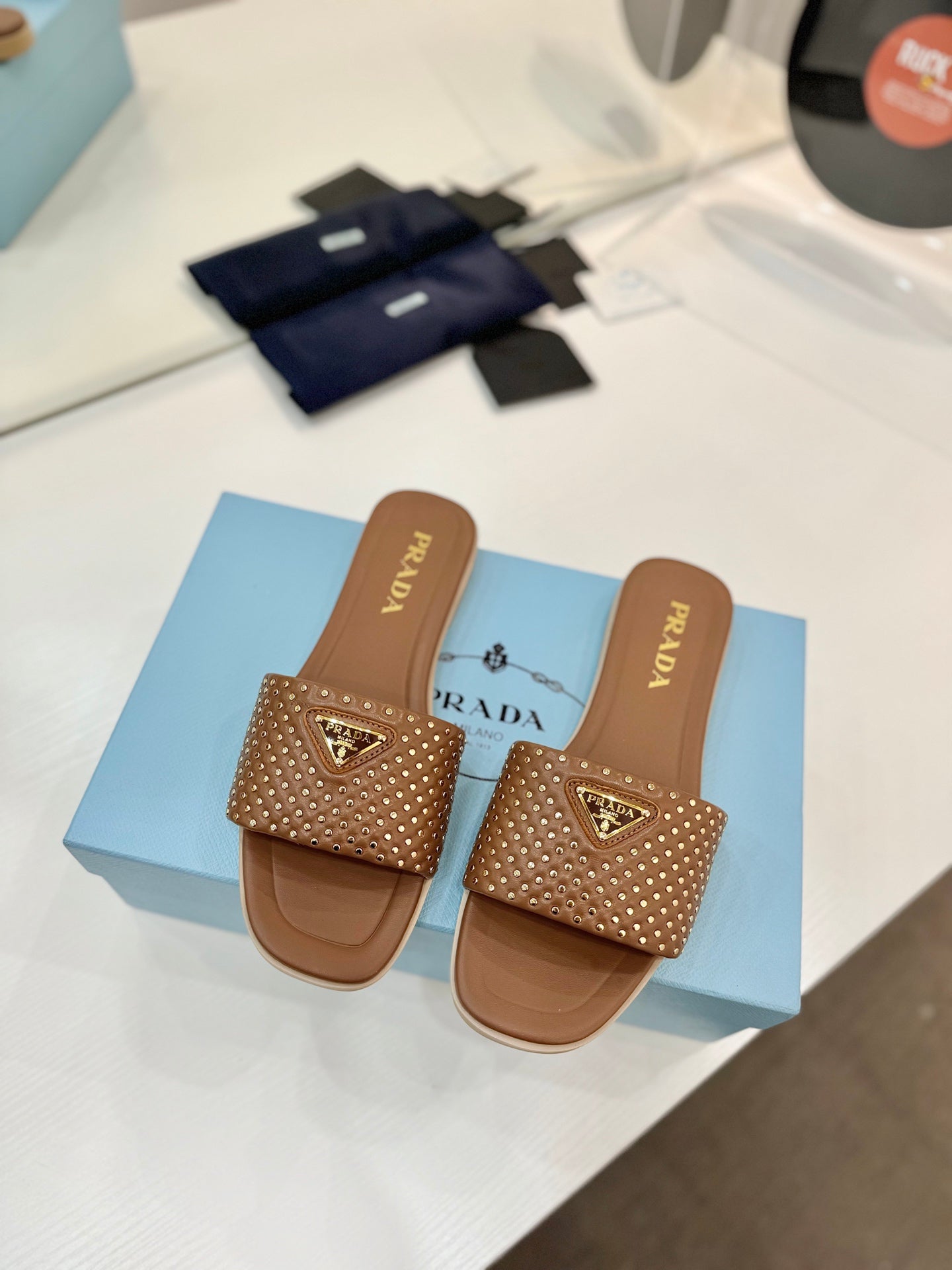 PR Nappa leather slides 1825032002
