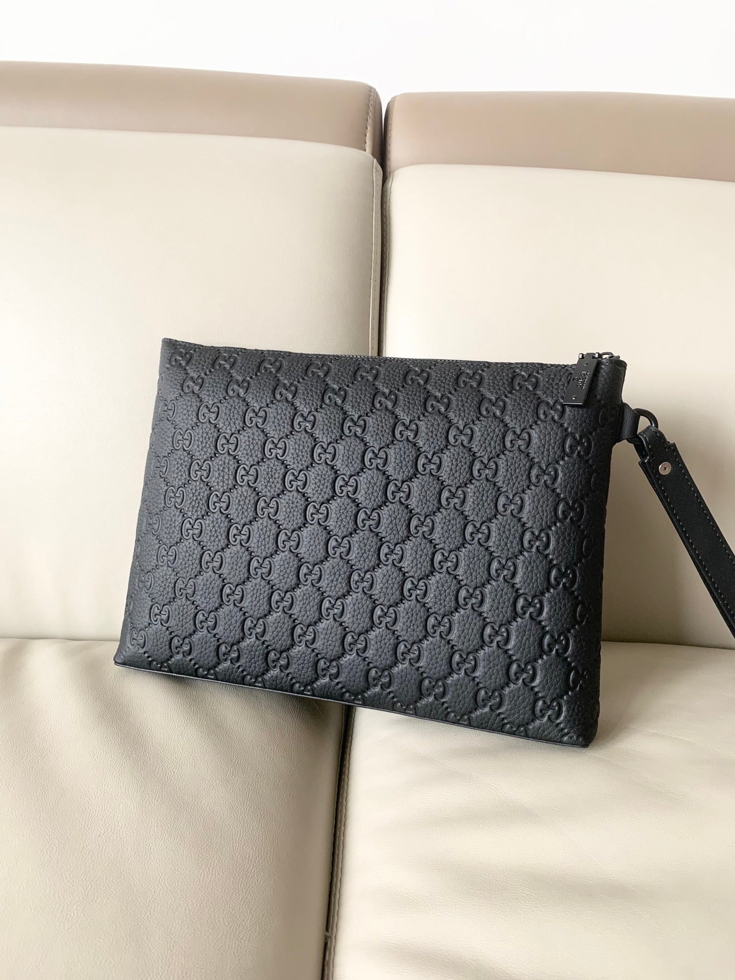GG Leather embossing clutch bag 1825042909