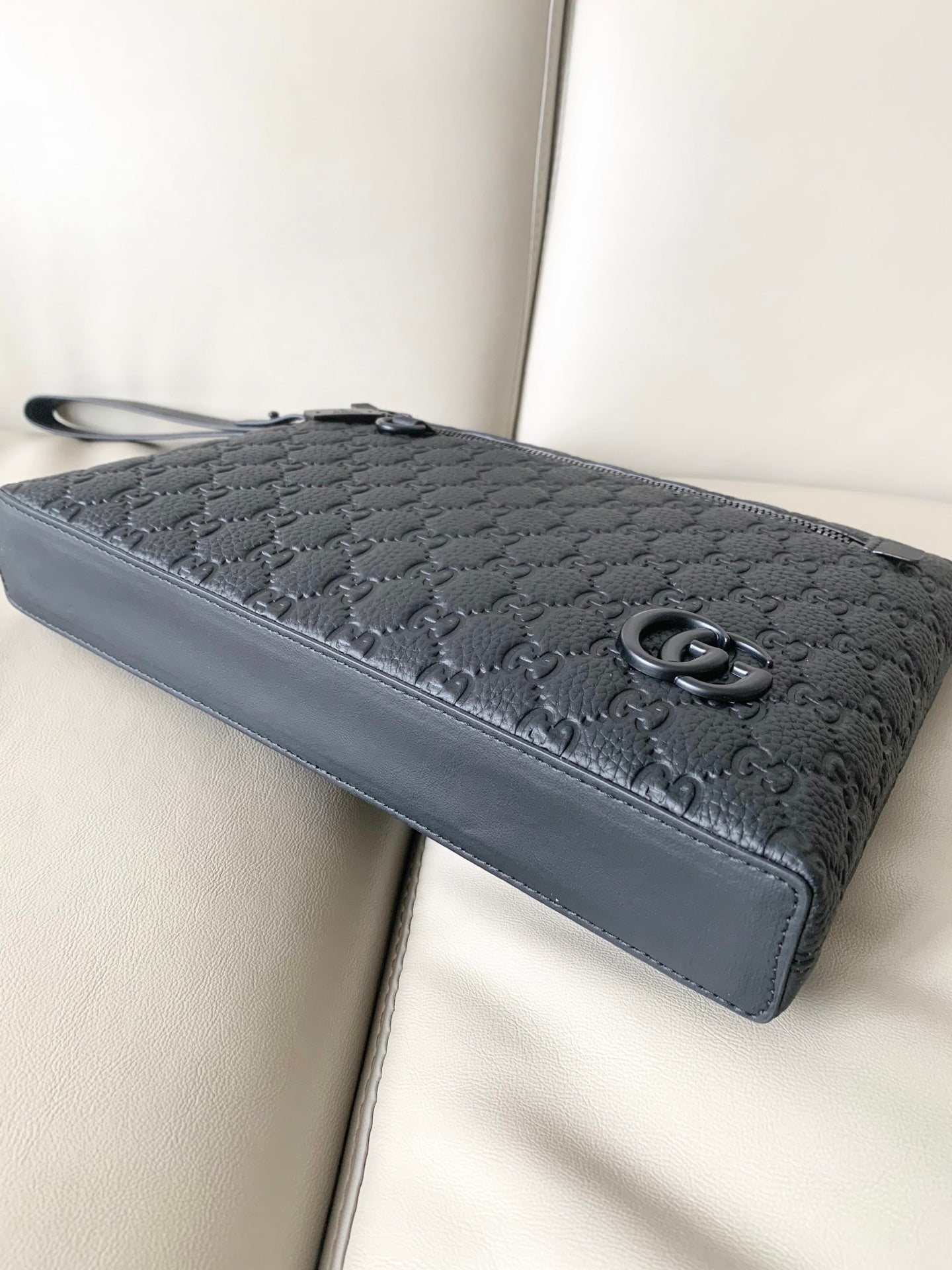 GG Leather embossing clutch bag 1825042909