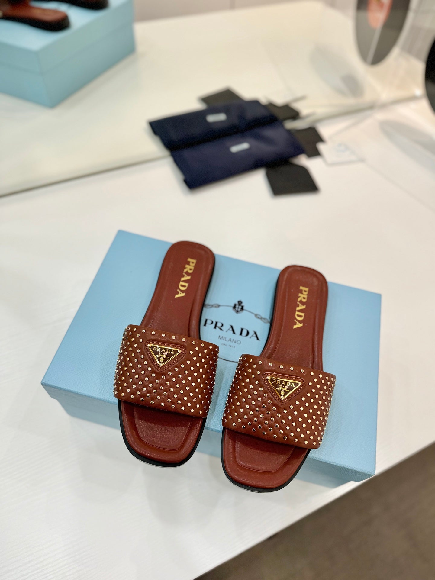 PR Nappa leather slides 1825032002
