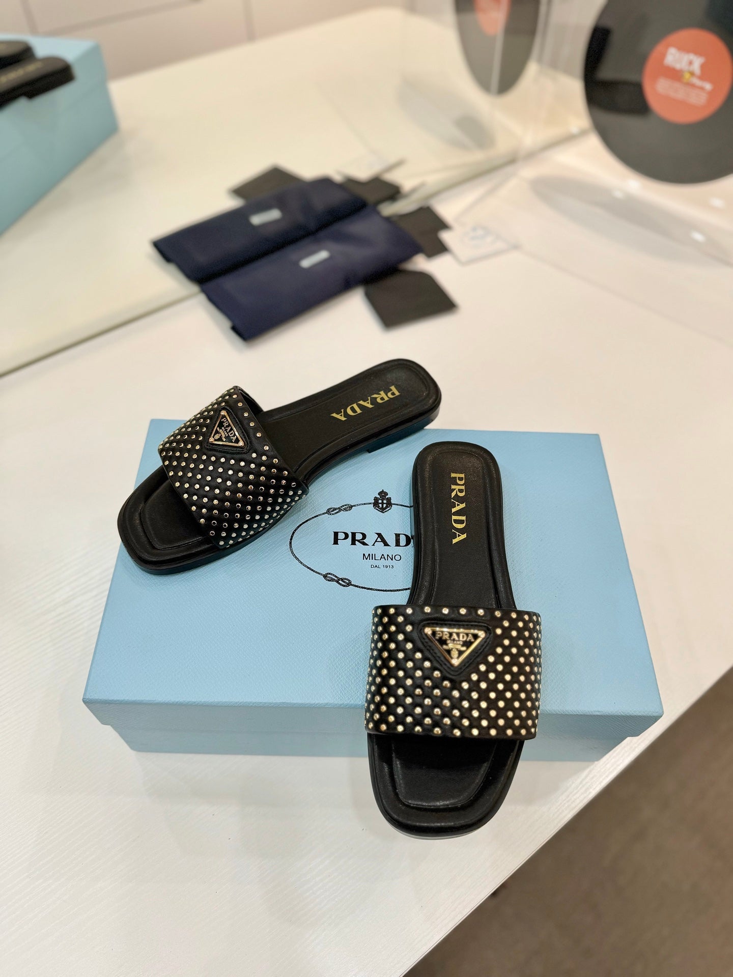 PR Nappa leather slides 1825032002