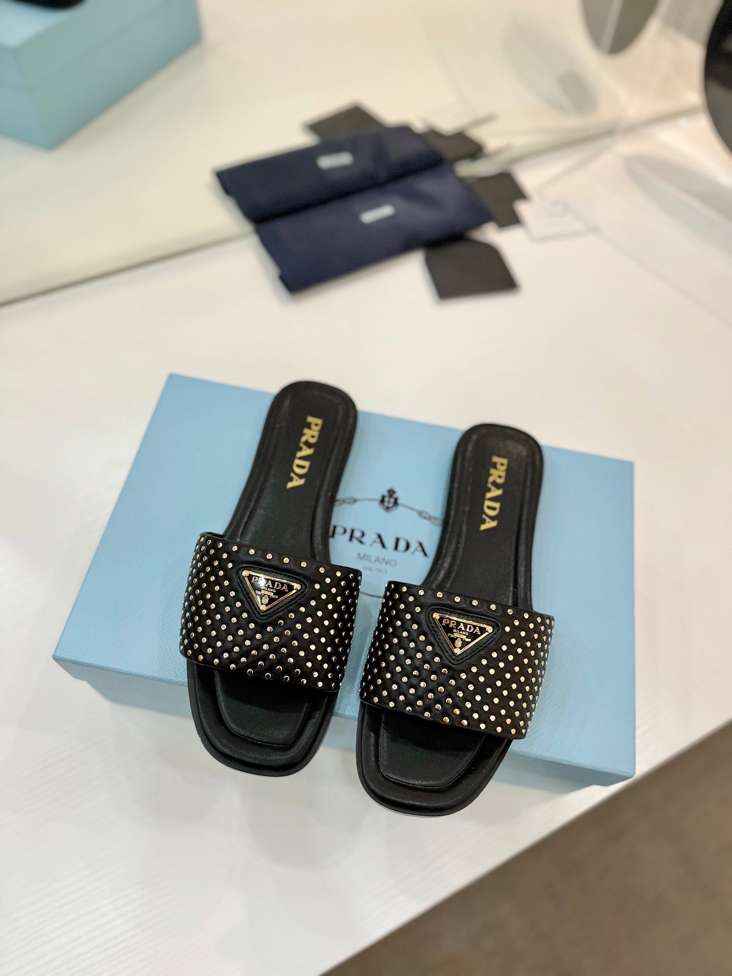 PR Nappa leather slides 1825032002