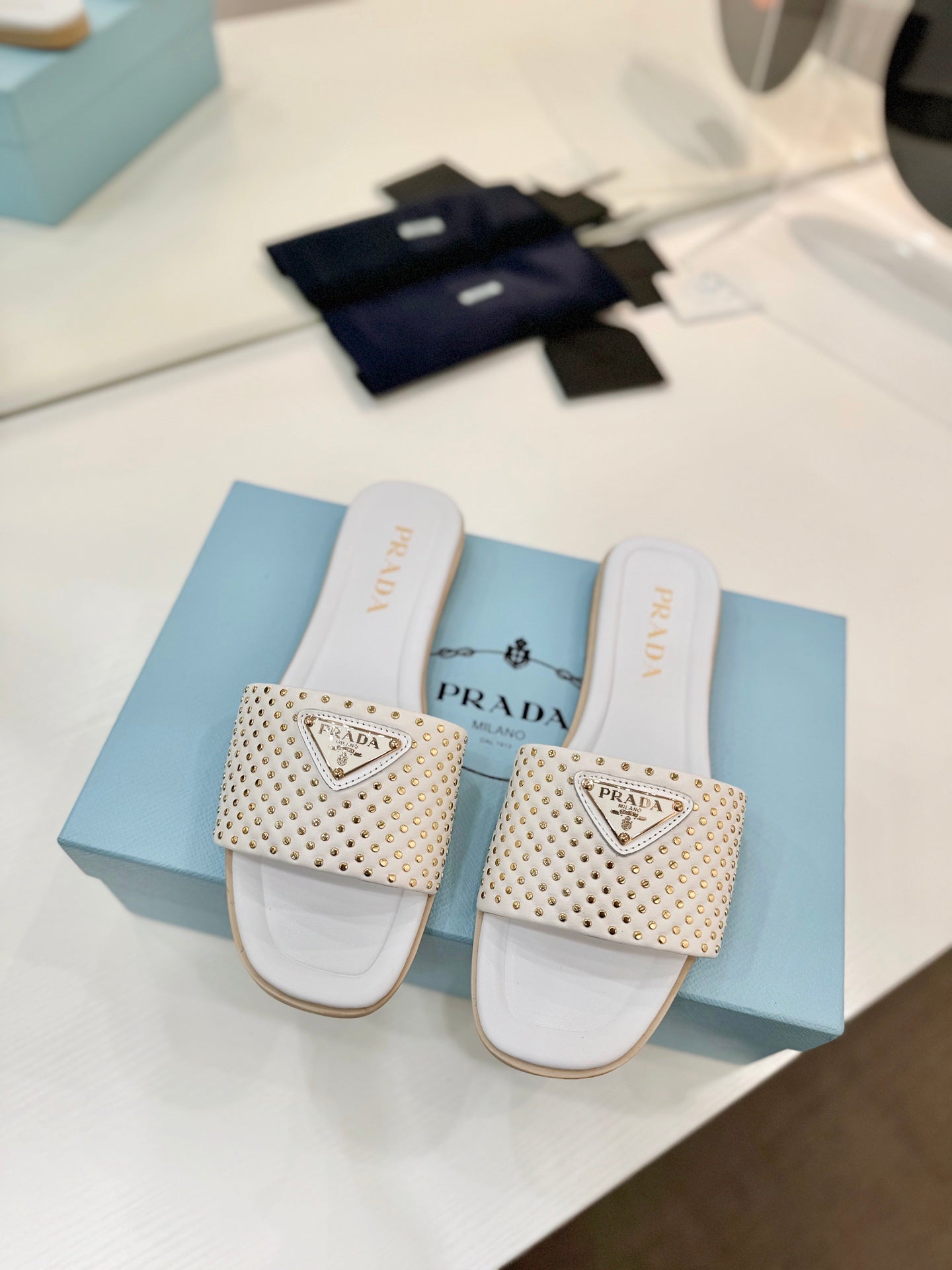 PR Nappa leather slides 1825032002