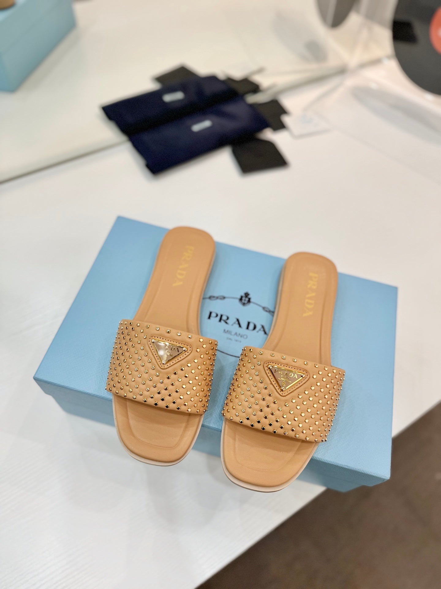 PR Nappa leather slides 1825032002